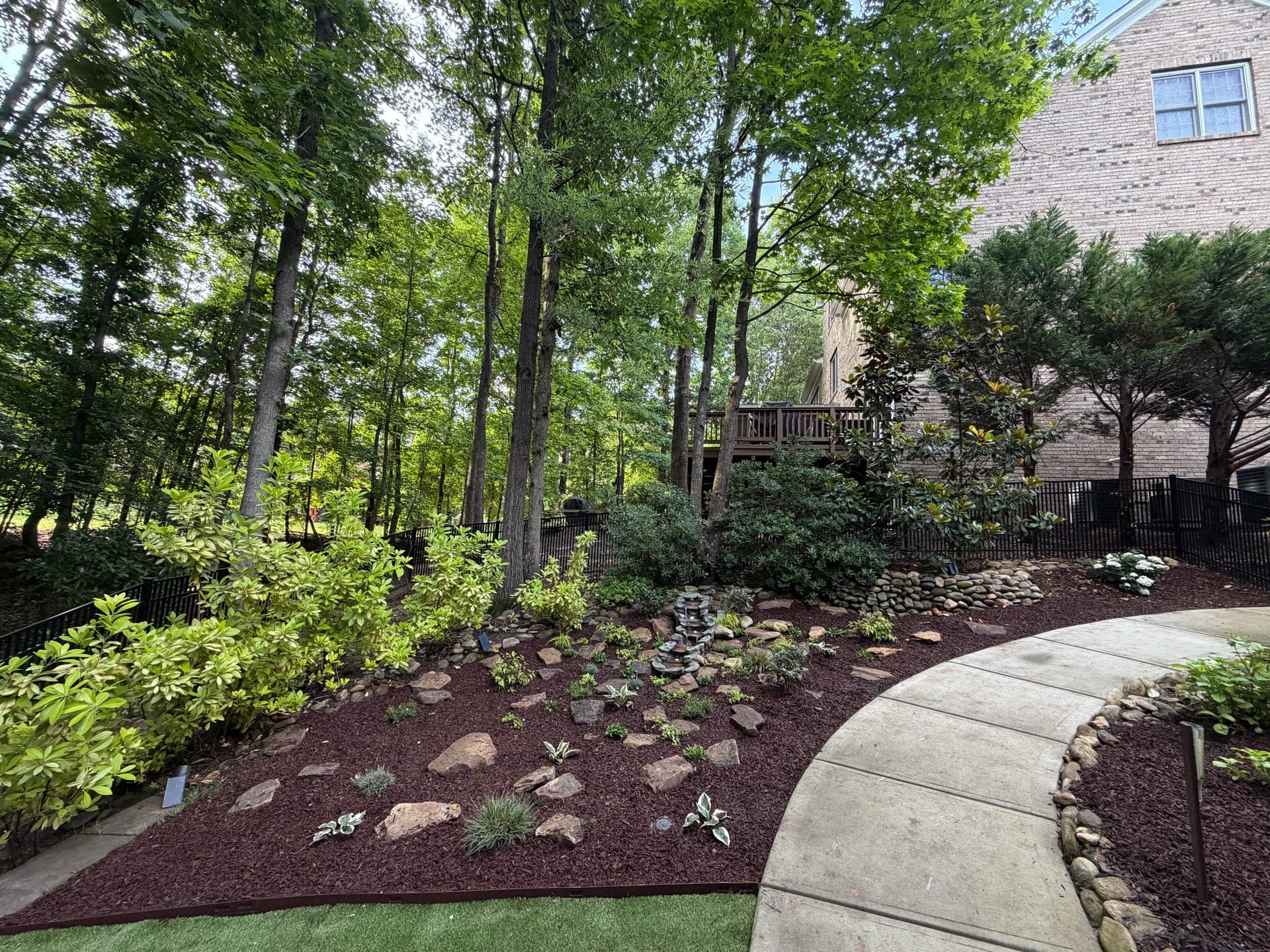 Mulch, plants, and decorative rock